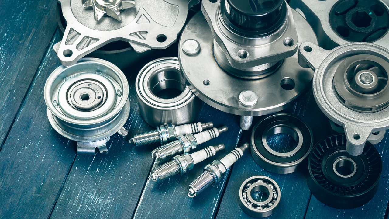 Various car parts including bolts, bearings, washers, and more.