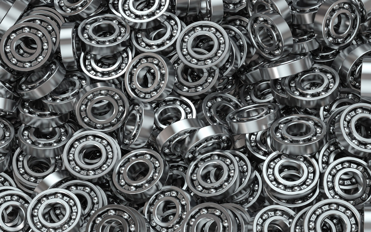 Montón de cojinetes con fondo de concepto industrial. Ilustración tridimensional